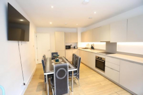 Spacious 3-Story Retreat with Rooftop Terrace and Modern Amenities